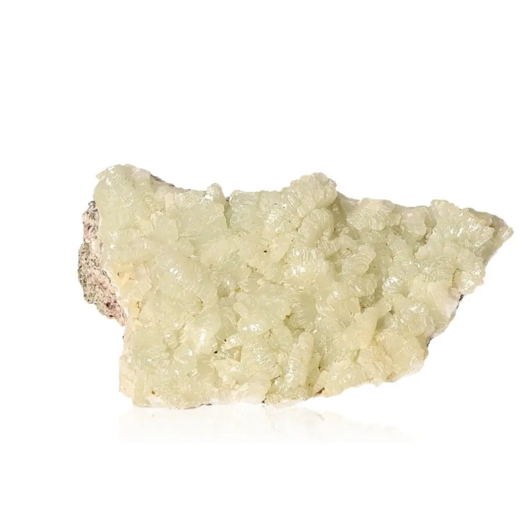 Prehnite druzy gemstone with pale green hues, renowned for its calming properties and ability to enhance spiritual growth.