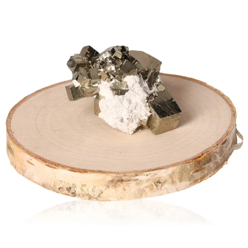 Close-up of a Pyrite Druze with Calcite crystal on a wooden base, showcasing its golden shimmer and white calcite contrast.