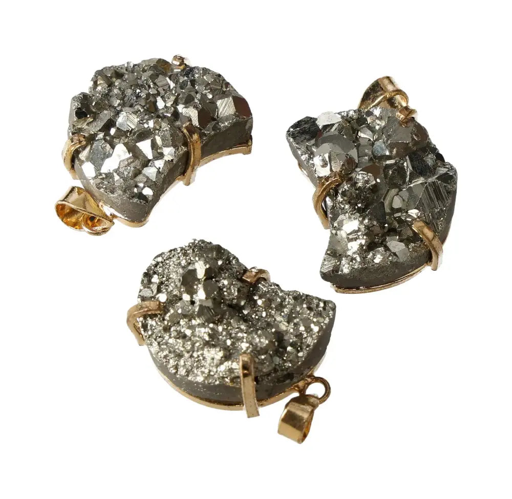 Gold moon-shaped pyrite claw pendants with a sparkling crystal texture.