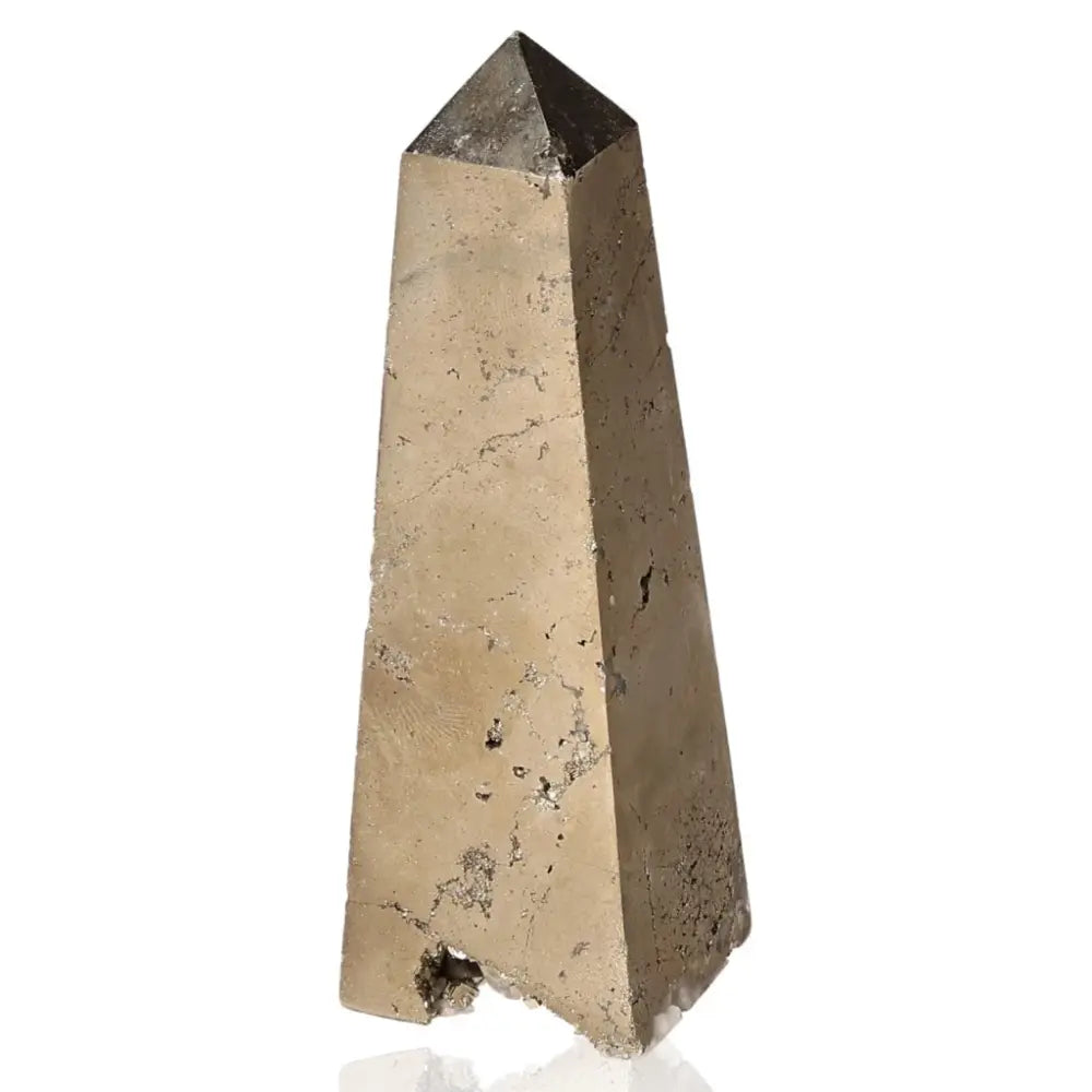 Polished pyrite obelisk with golden metallic luster, symbolizing abundance and prosperity; known as "Fool's Gold."