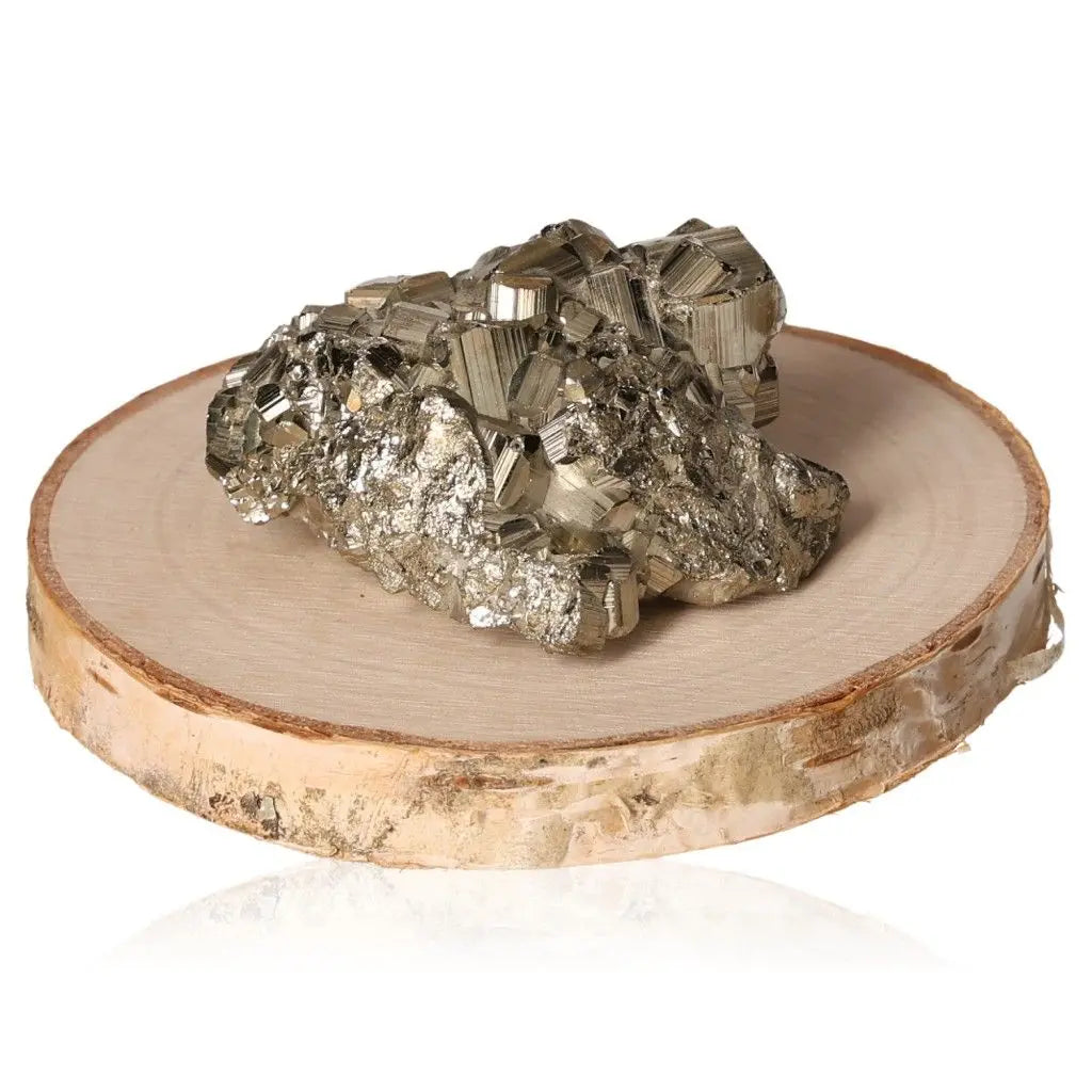 Polished pyrite druze on wooden base, known as "Fool's Gold," with radiant golden hue and metallic luster, symbolizing abundance.