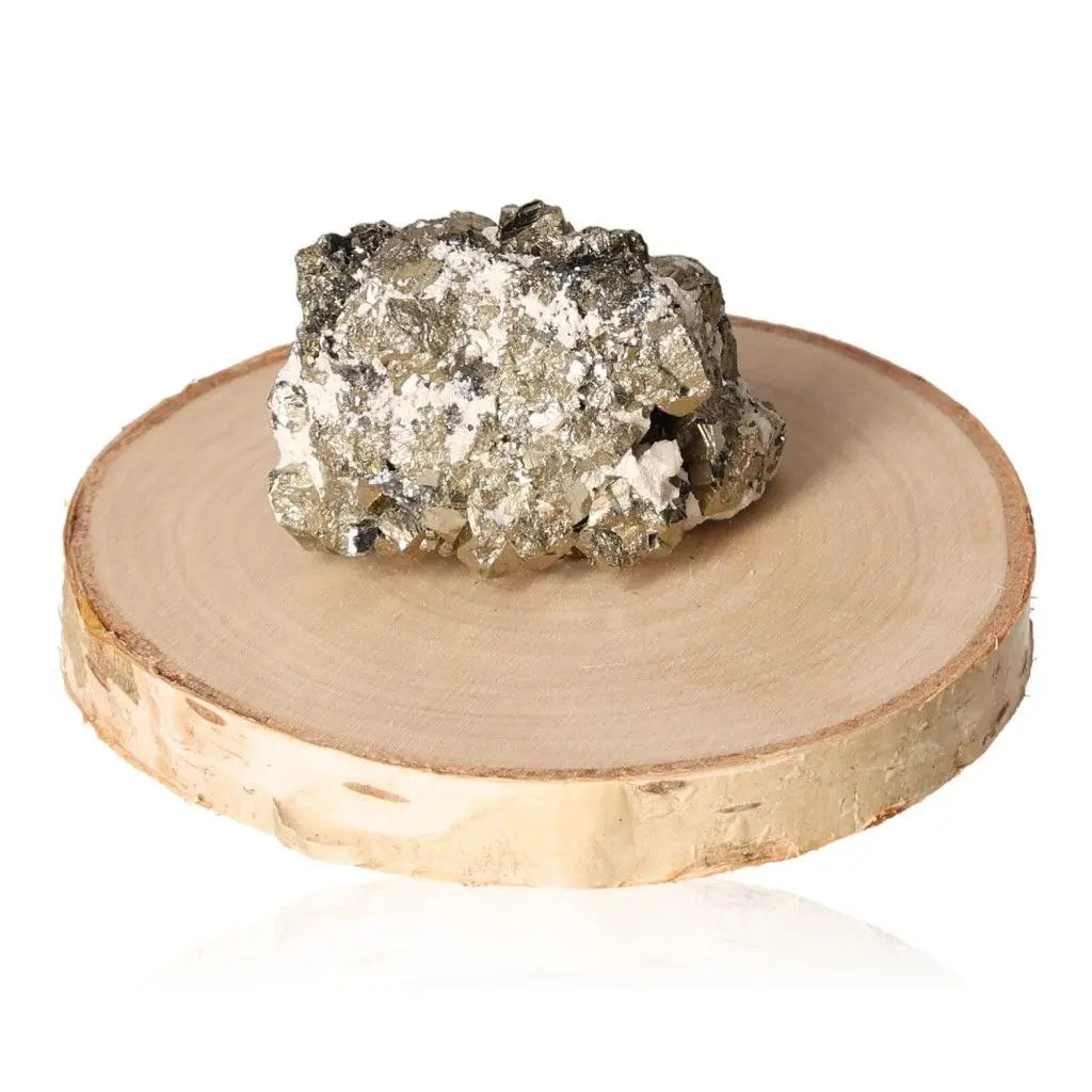 Pyrite druzy stone on a wooden base showcasing its golden metallic luster, symbolizing abundance and prosperity.