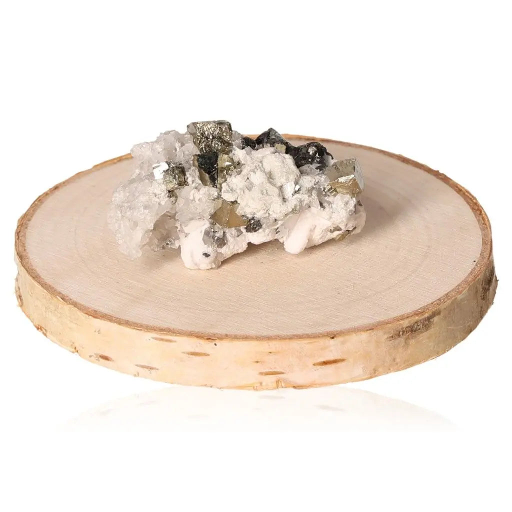 Natural pyrite druzes on a wooden disc, showcasing its golden hue and metallic luster, known as "Fool's Gold" for abundance and prosperity.