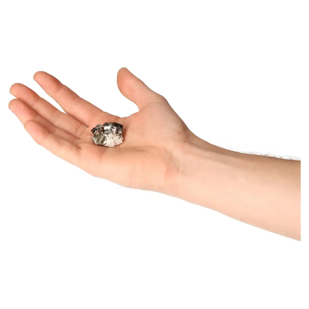 Person holding a sparkling pyrite druzy known for its golden hue and metallic luster, symbolizing prosperity and abundance.