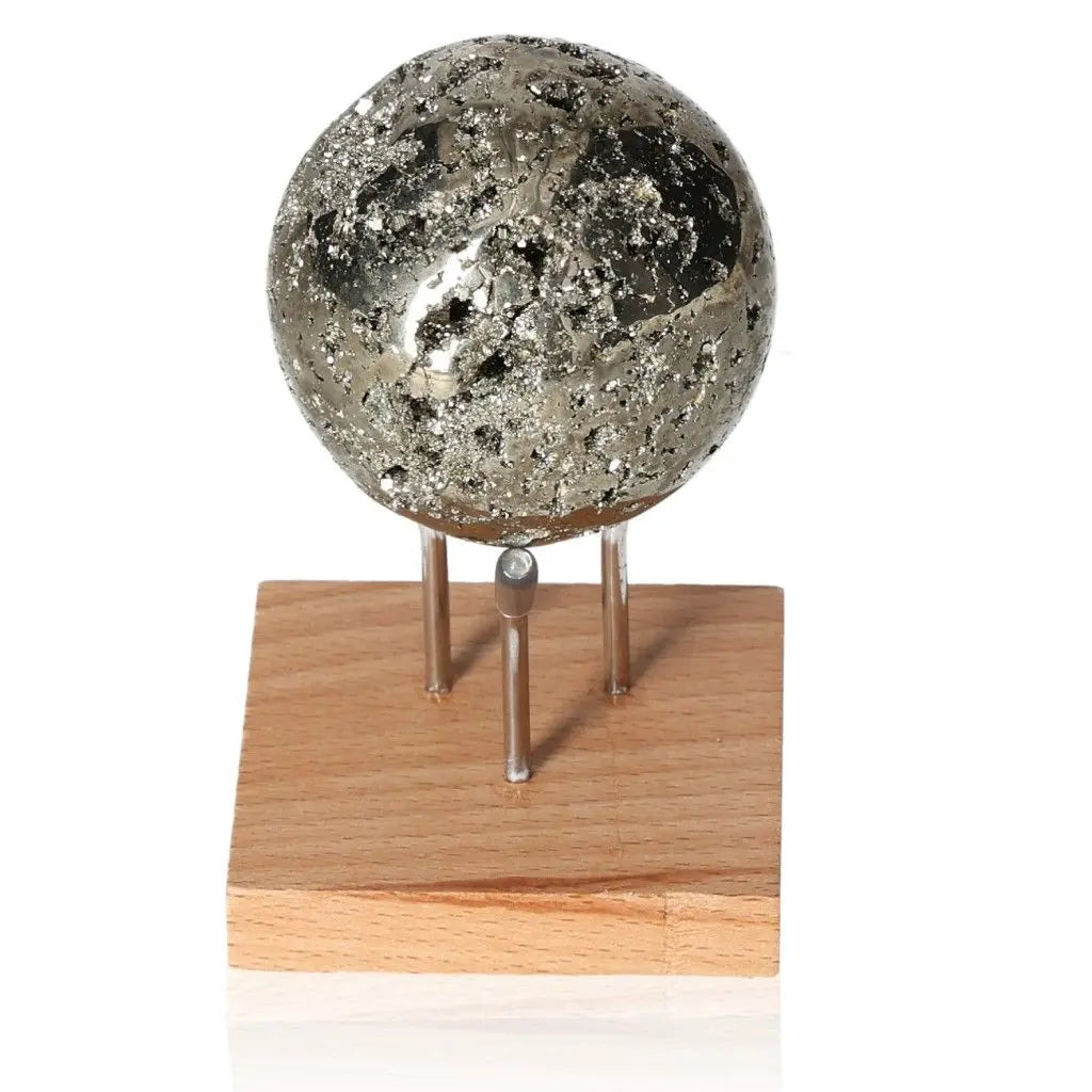 Pyrite sphere on display stand, showcasing its metallic luster and golden hue, symbolizing prosperity and abundance.