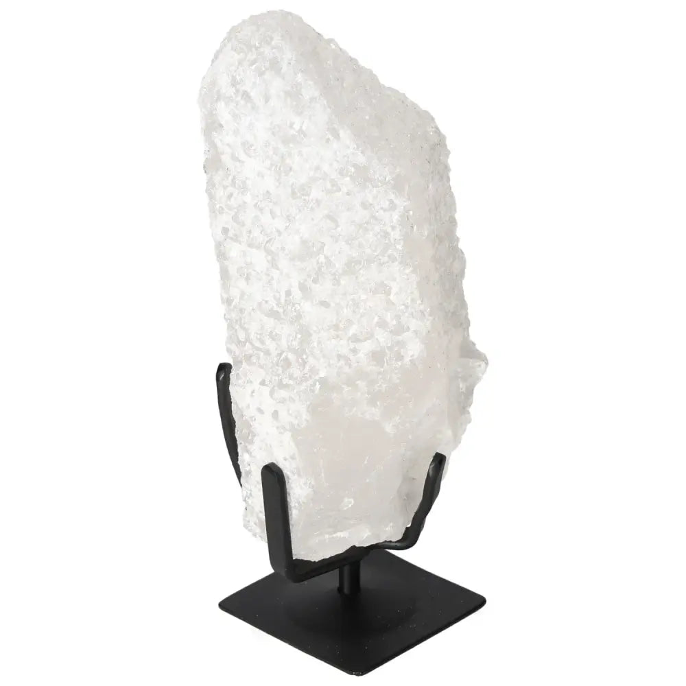 Quartz Crystal Bubble from Sylvia Crystals on display stand, showcasing its unique color variations and natural elegance.