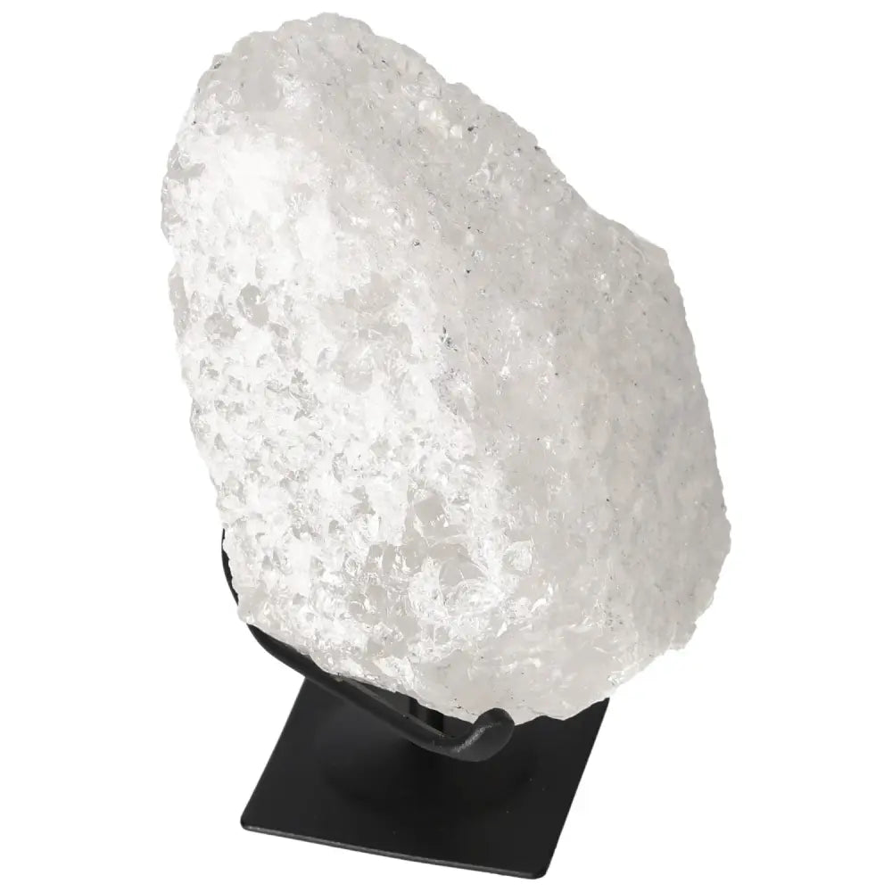 Quartz Crystal Bubble on display stand, showcasing its radiant, textured surface, representing Sylvia Crystals' premium harmonizing energy.