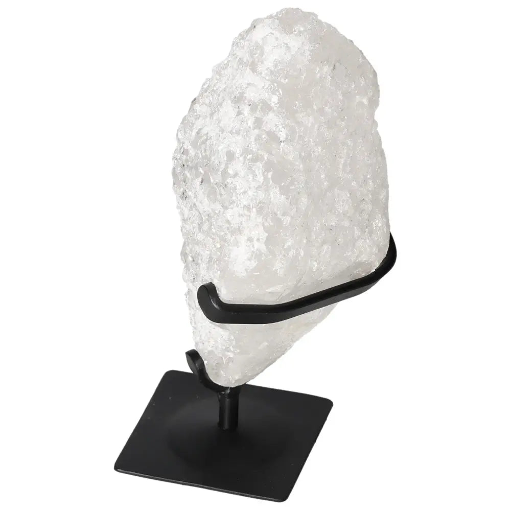 Quartz Crystal Bubble by Sylvia Crystals on a display stand, showcasing its unique texture and spiritual elegance.