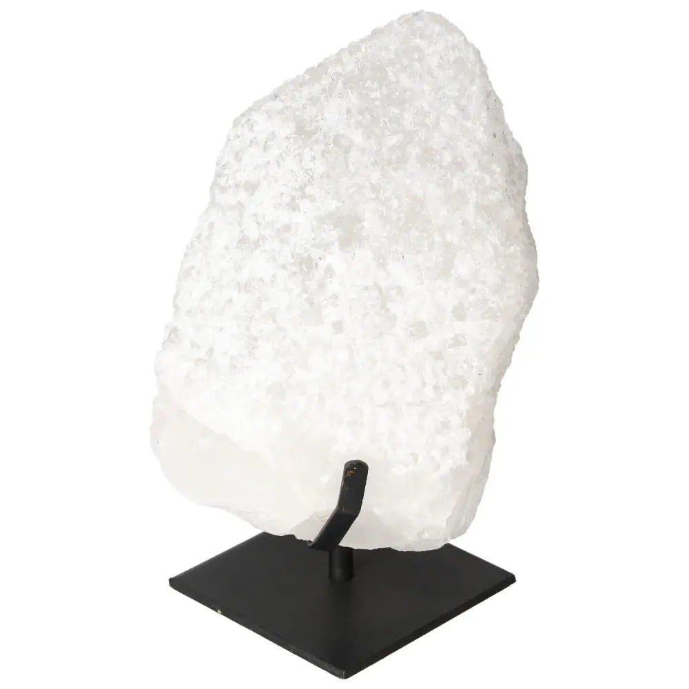 Quartz Crystal Bubble from Sylvia Crystals on display stand showcasing multifaceted structure and energetic properties.