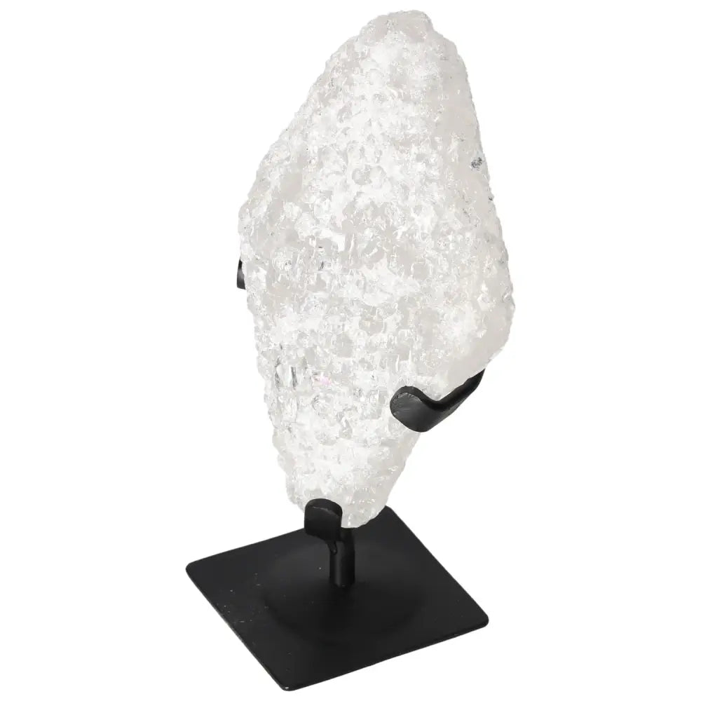 Quartz Crystal Bubble by Sylvia Crystals on a black stand, showcasing its sparkling clarity and spiritual design in home decor.