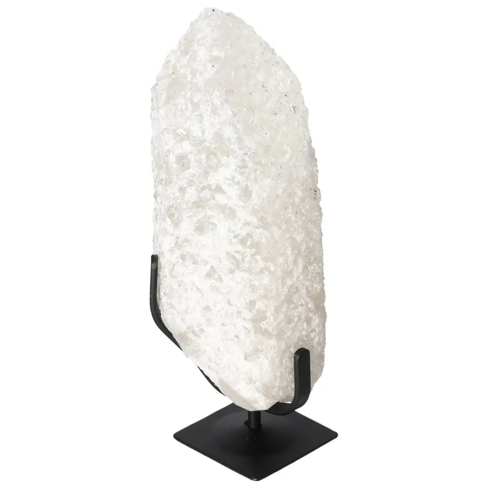 Quartz Crystal Bubble on display stand, showcasing its sparkling texture and spiritual energy.