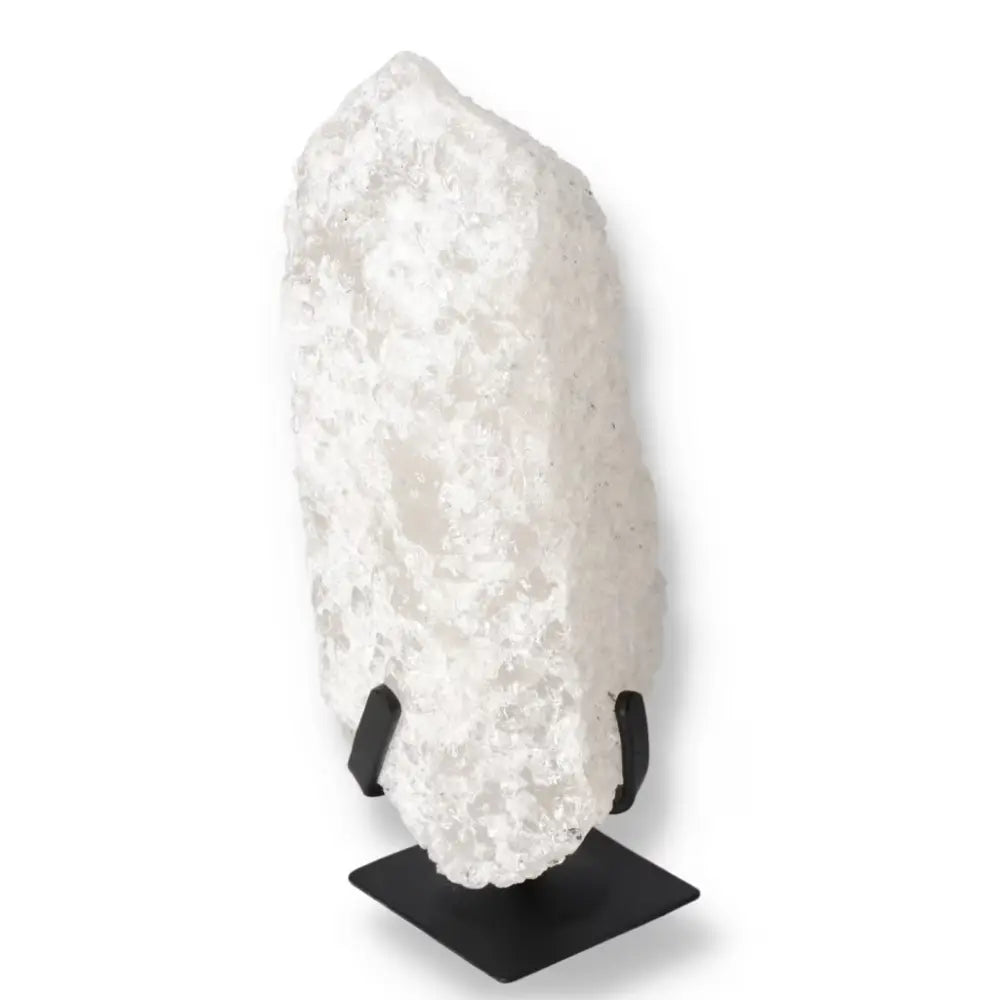 Quartz Crystal Bubble by Sylvia Crystals on stand, showcasing elegance and spiritual harmony.