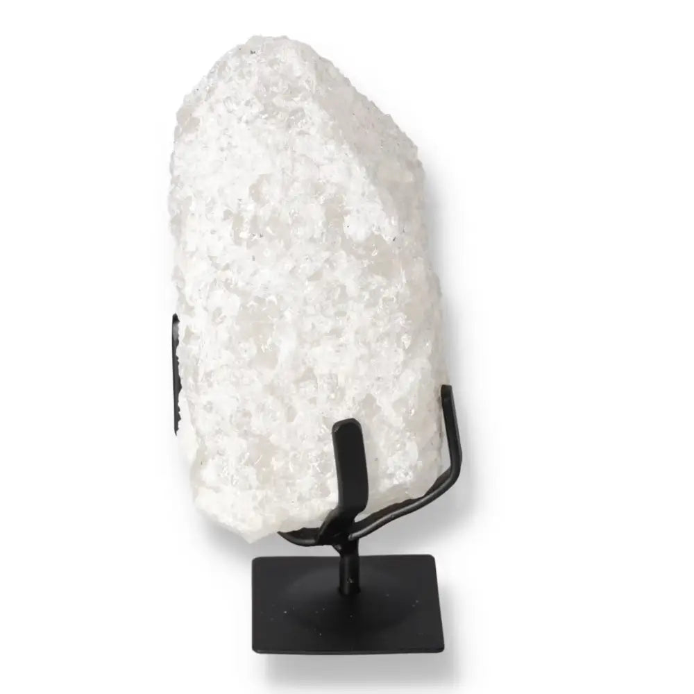 Quartz Crystal Bubble on a black metal stand from Sylvia Crystals, showcasing its natural beauty and metaphysical properties.
