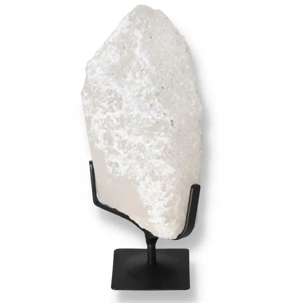 Quartz Crystal Bubble by Sylvia Crystals on Display Stand, Enhancing Spiritual Wellness and Harmony.