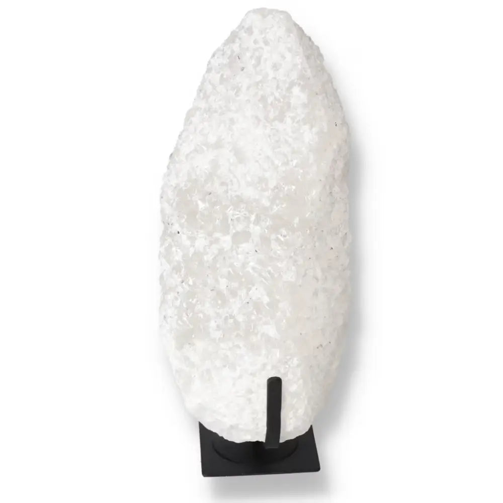 Quartz Crystal Bubble on black stand, featuring natural textures and spiritual energy hues, from Sylvia Crystals Collection.