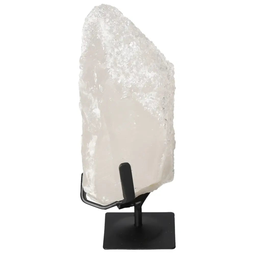 Quartz Crystal Bubble by Sylvia Crystals on black stand, embodies elegance and spiritual harmony for holistic wellness and personal growth.