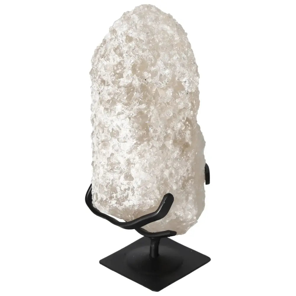 Quartz Crystal Bubble on black stand, premium gemstone from Sylvia Crystals, known for chakra resonance and spiritual harmony.