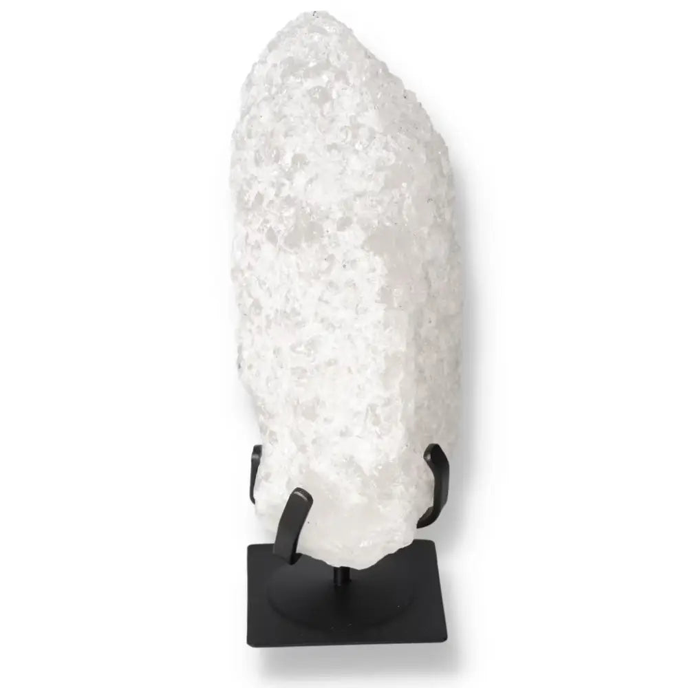 Quartz Crystal Bubble by Sylvia Crystals on display stand for spiritual enhancement.