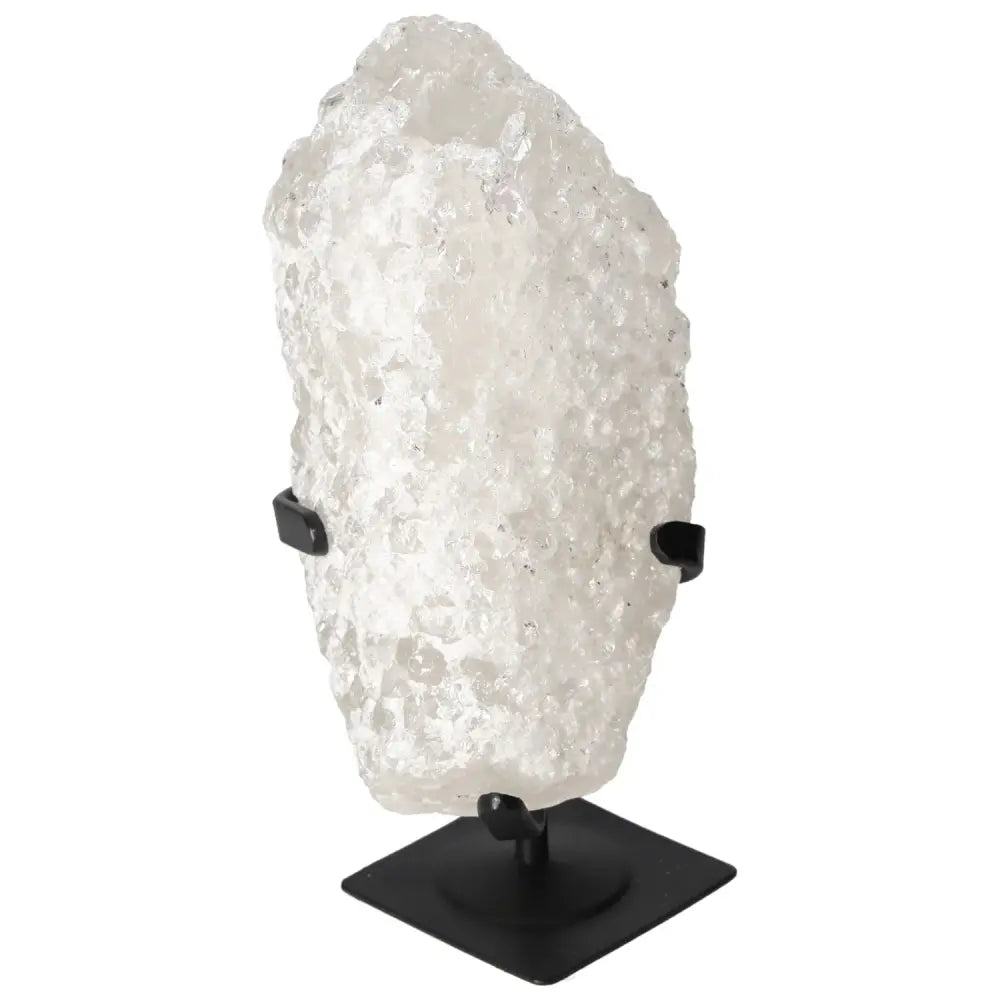 Quartz Crystal Bubble by Sylvia Crystals, luxurious spiritual stone for chakra alignment and balance, on black stand.