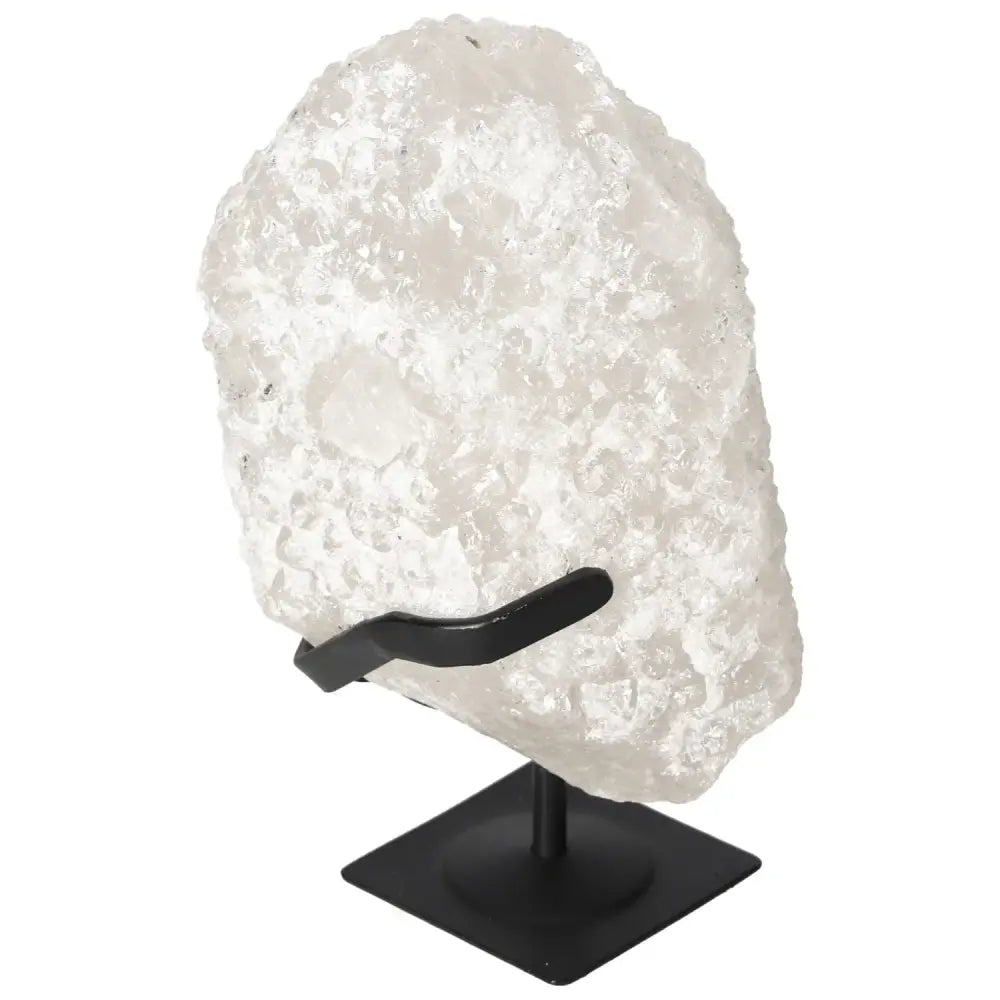 Quartz Crystal Bubble by Sylvia Crystals displayed on a stand, showcasing its clarity and spiritual resonance for chakra alignment.