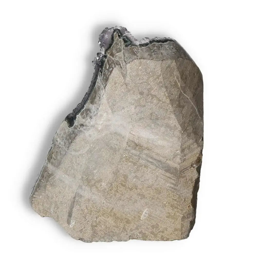 Quartz Cut Base Geode from Sylvia Crystals, showcasing striking patterns and natural beauty, ideal for enhancing peace and tranquility.