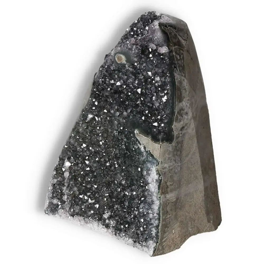 Quartz Cut Base Geode with sparkling crystals and intricate patterns, enhancing space with beauty and tranquility. Sylvia Crystals.