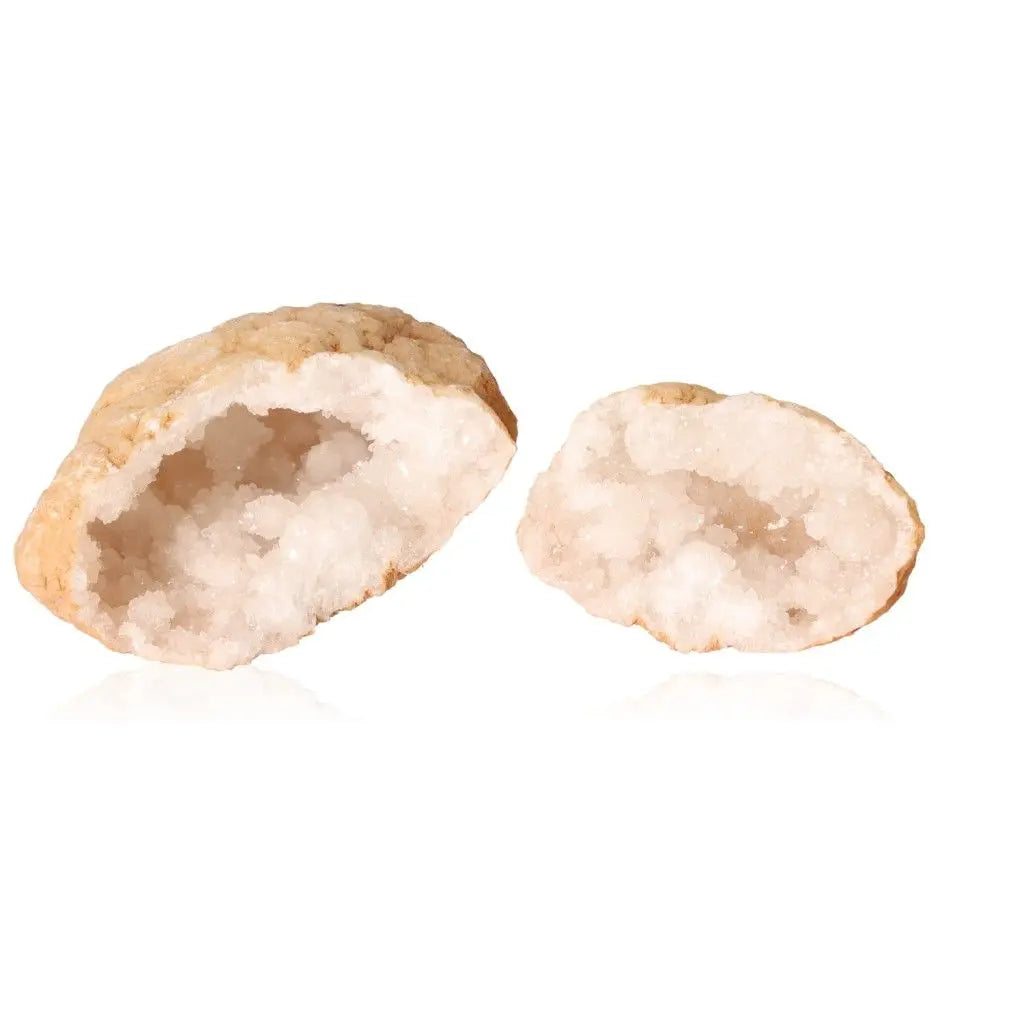 Two quartz geodes showcasing crystalline interiors, perfect for energy purification and home decor enhancement.