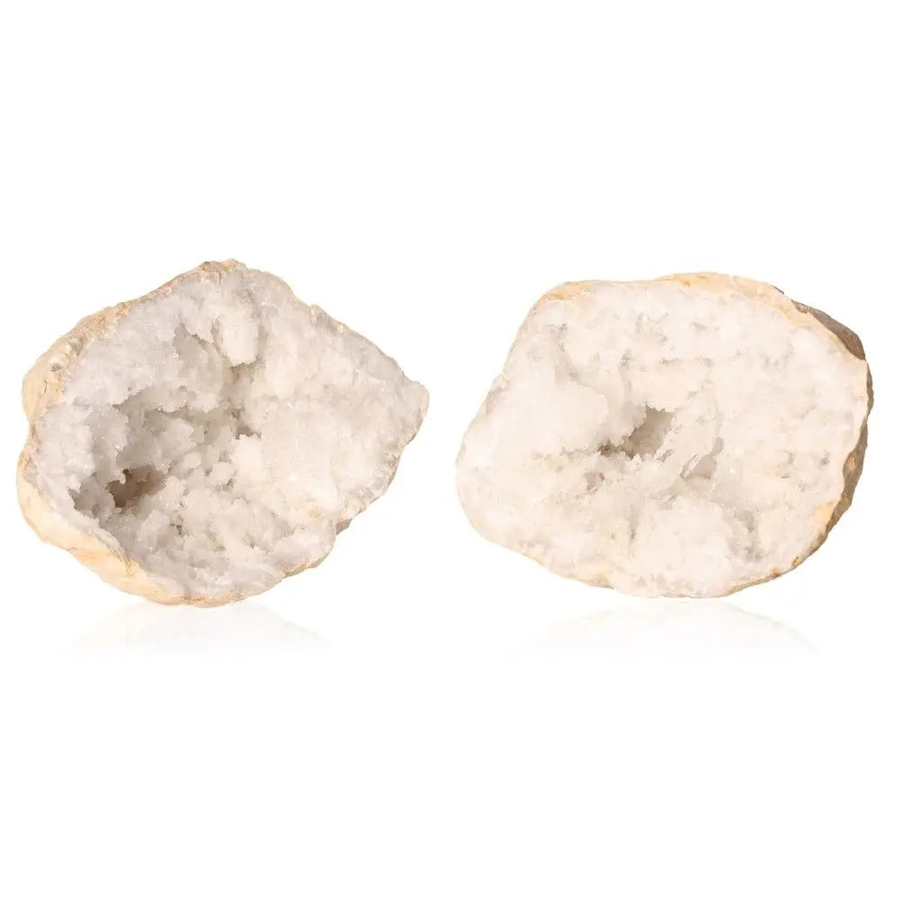 Quartz geode with sparkling white crystals, showcasing natural beauty and elegance, ideal for transforming spaces with serene energy.