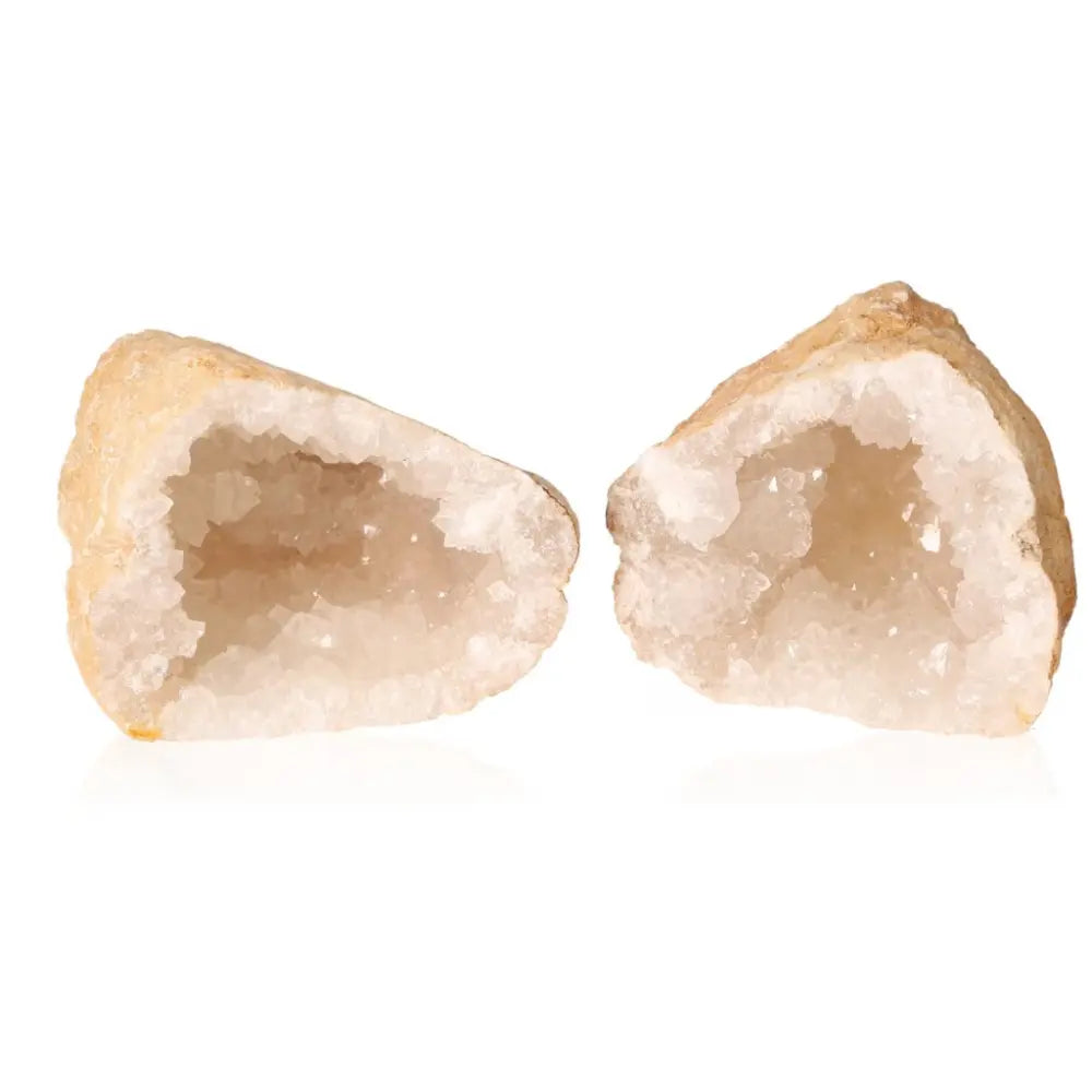 Quartz geode cut open to reveal milky white crystals inside, weighing 400-600g, showcasing nature's hidden treasures and mystical beauty.