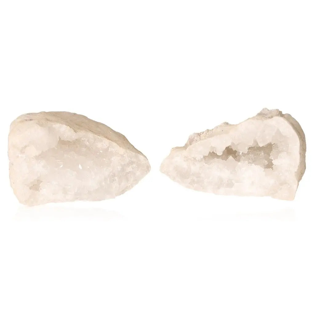 Quartz Geode (400-600g) displaying sparkling white crystals inside rugged shell, known for energy-cleansing and spiritual allure.