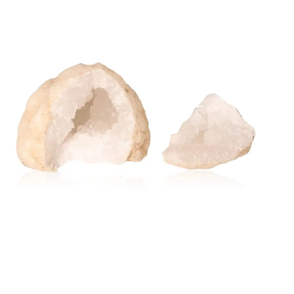 Quartz geode split open to reveal sparkling white crystals, showcasing natural beauty and tranquility. Weight: 400-600g.