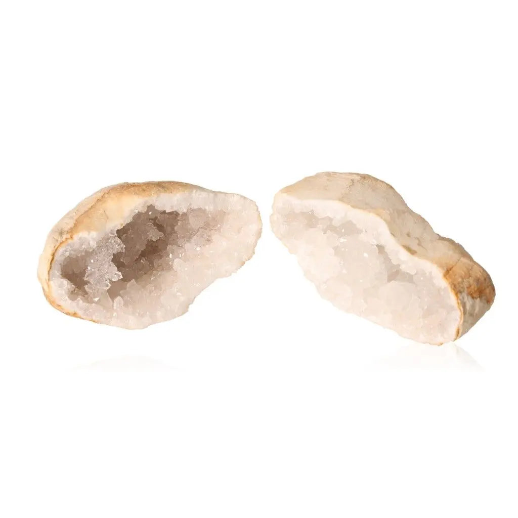 Quartz Geode weighing 400-600g showcasing its rugged shell and sparkling, cloudy white crystals, perfect for energy purification and amplification.