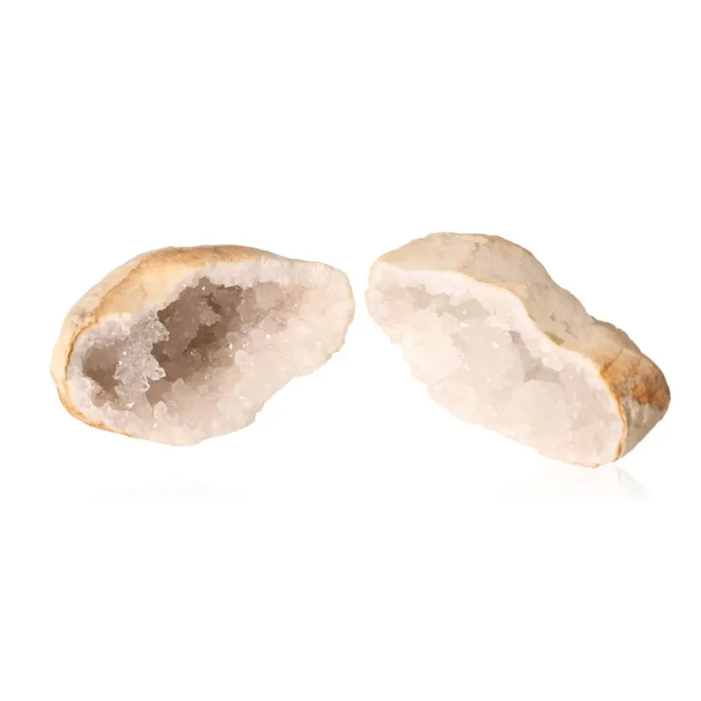 Quartz geode weighing 400-600g with shimmering white crystals and earthy outer shell, showcasing natural beauty and energy properties.