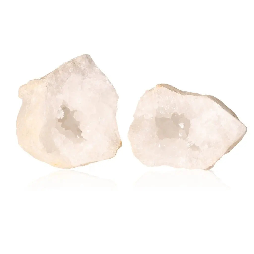 Milky quartz geode showcasing cloudy white crystal interiors, weighing between 400-600g, ideal for decor and tranquility.