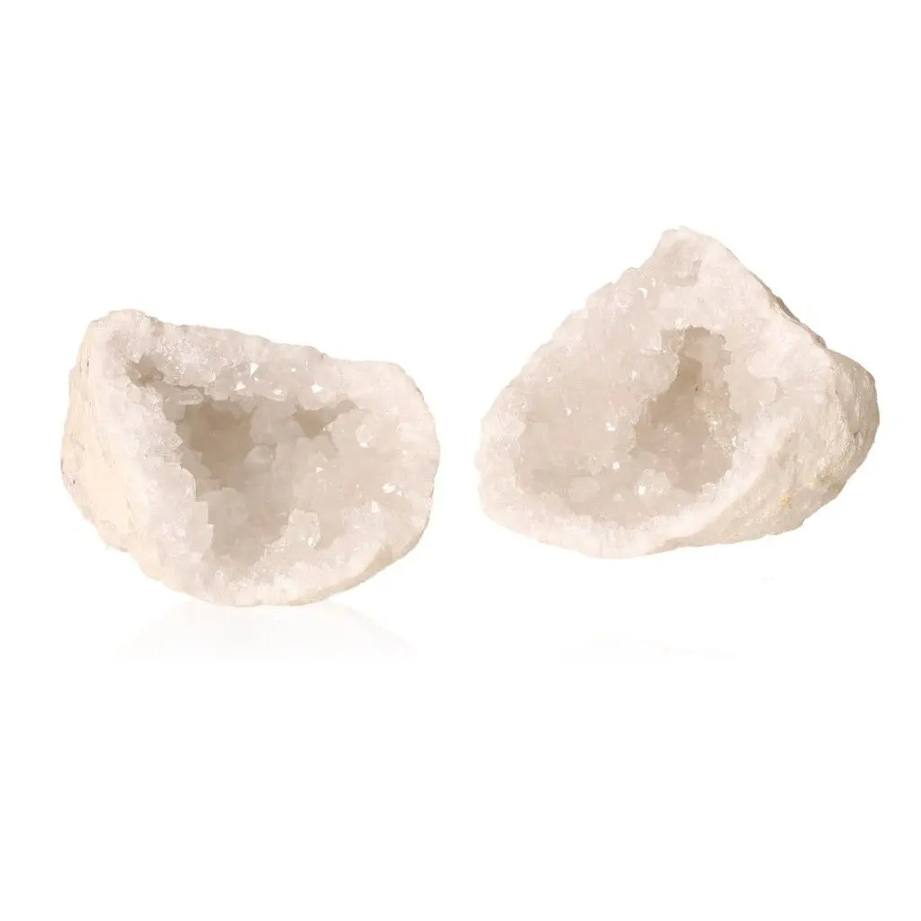 Quartz geode split in half displaying sparkling cloudy white crystals, weighing between 400-600g, on a white background.