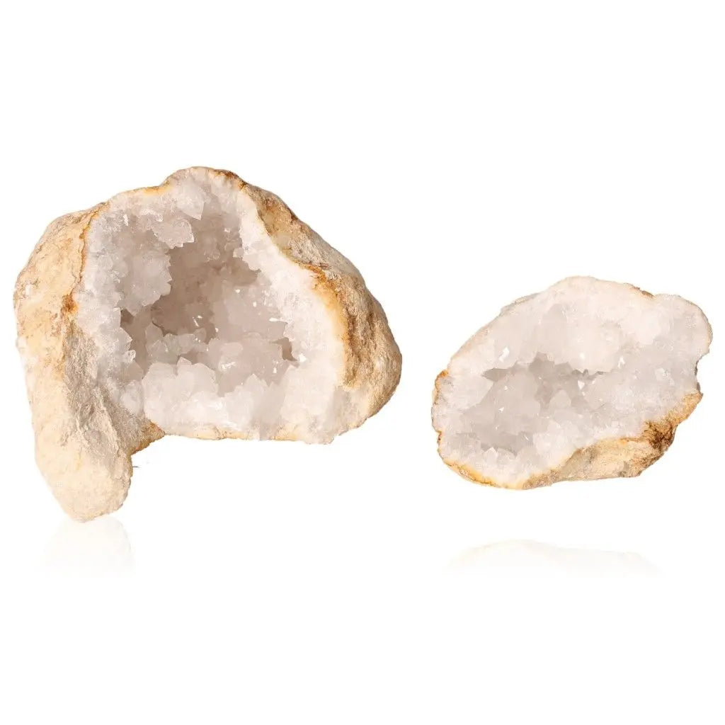 Quartz geode split open revealing sparkling white crystals, ideal for decoration and energy amplification, weighing 400-600g.
