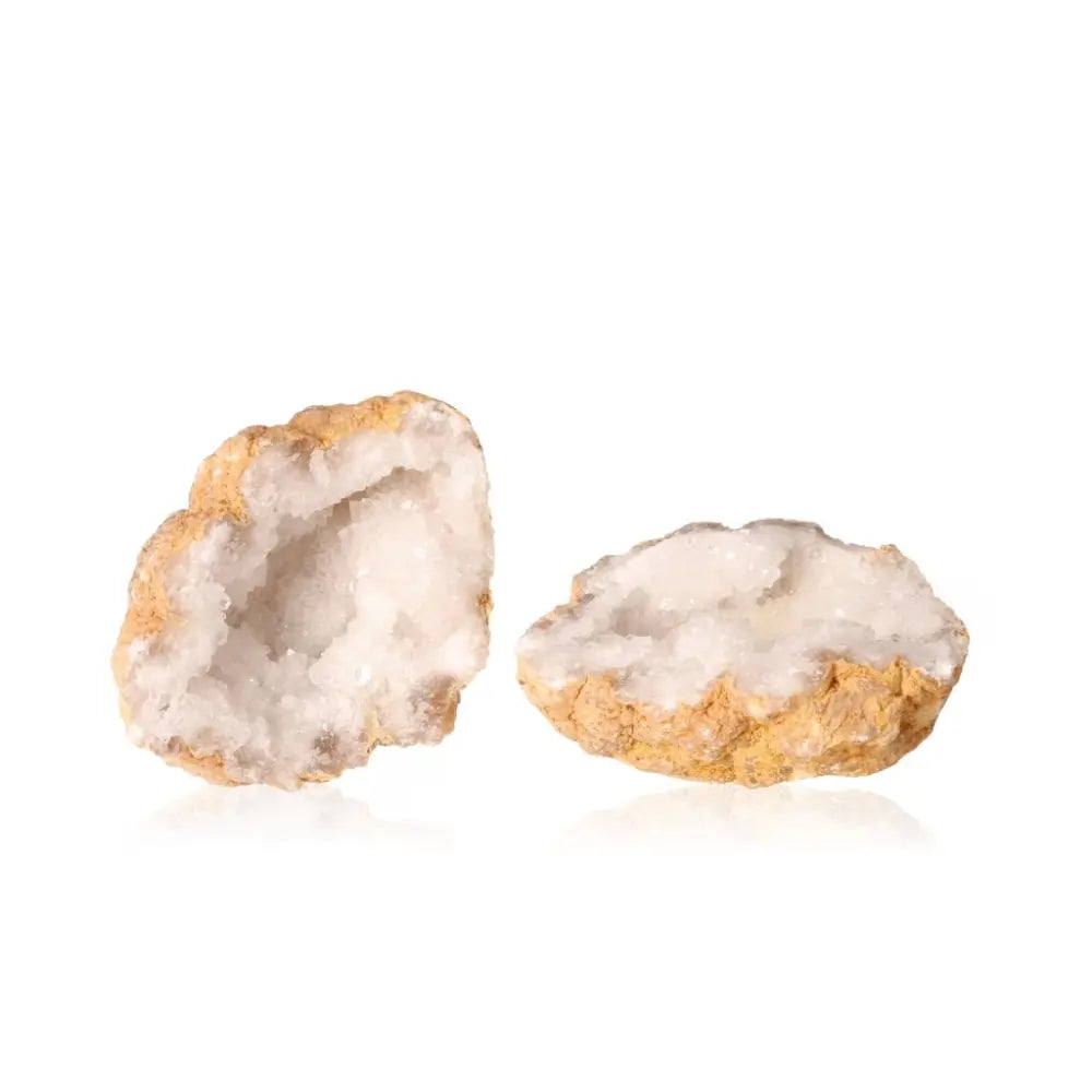 Quartz Geode (700-900g) with a rugged exterior and white crystal interior, ideal for adding natural elegance and energy to any space.