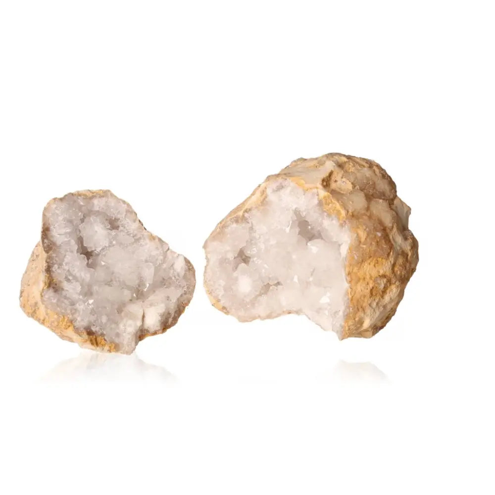 Open Quartz Geode with sparkling white crystals and rugged earthy exterior, weighing 700-900g, showcasing nature's mystical allure.
