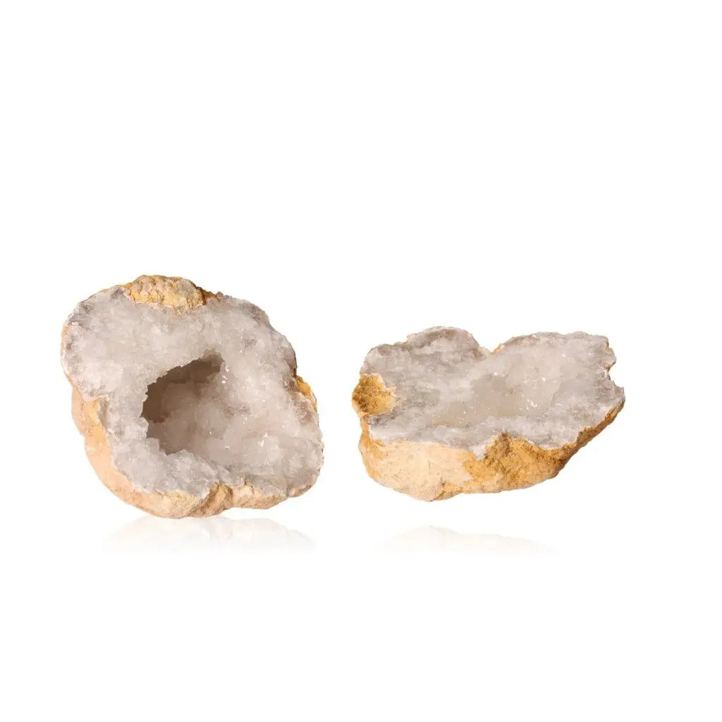 Quartz Geode 700-900g showcasing sparkling white crystals inside a rugged shell, ideal for amplifying and purifying energy.