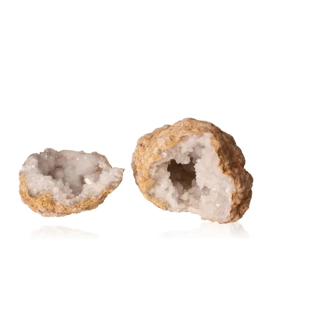 Quartz Geode split open showing cloudy white crystals inside, weighing 700-900g, ideal for creating a peaceful sanctuary.