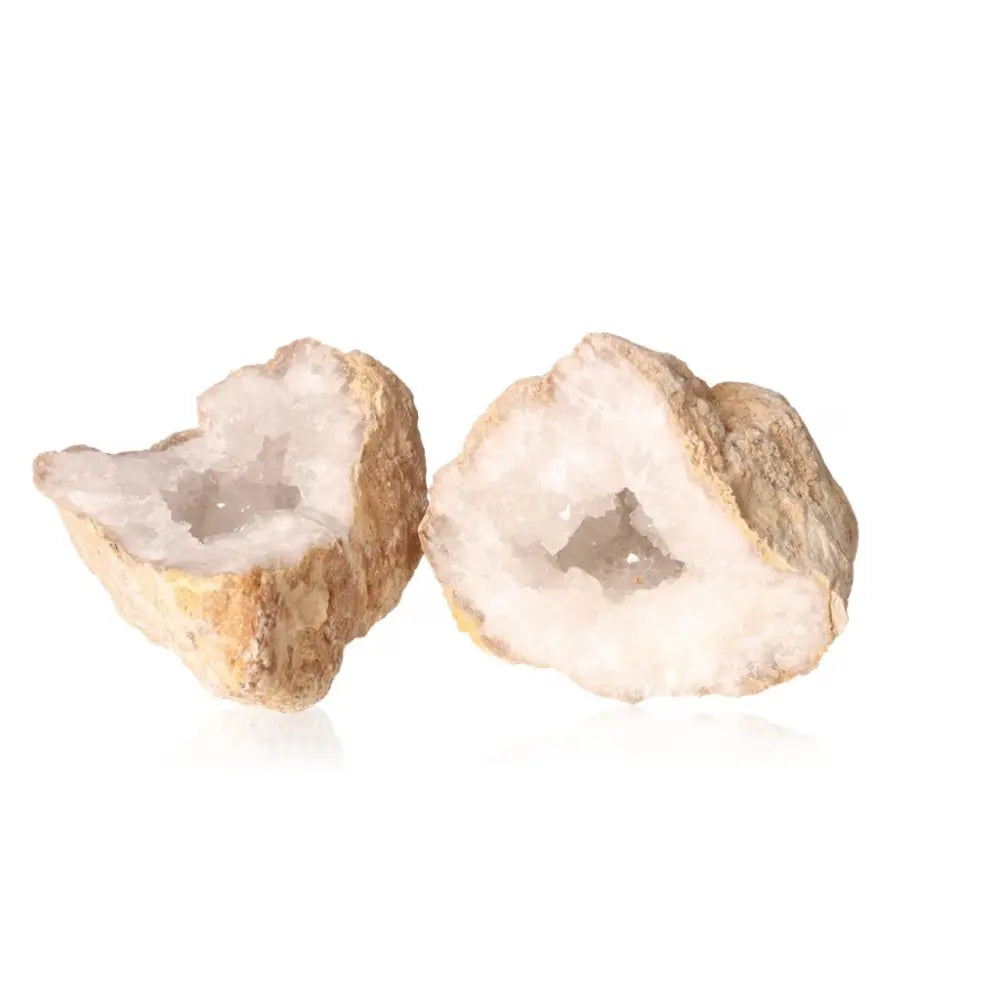 Quartz Geode weighing 700-900g with a rugged exterior, featuring a sparkling interior display of cloudy white crystals.