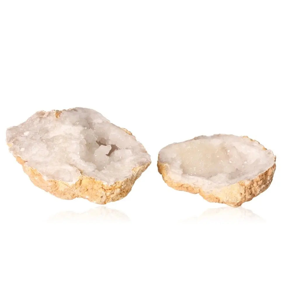 Quartz geode with sparkling white crystals, showcasing rugged exterior and purifying energy properties. Weighs 700-900g.