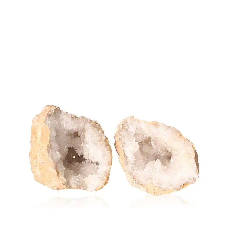Quartz Geode 700-900g with sparking crystalline core against white background
