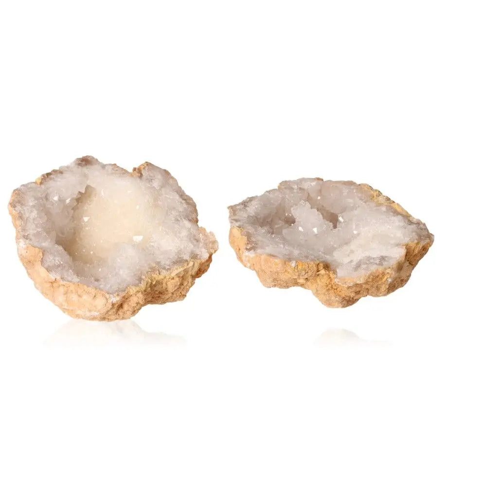 Quartz Geode with sparkling white crystals weighing 700-900g, showcasing a rugged exterior and serene interior beauty.