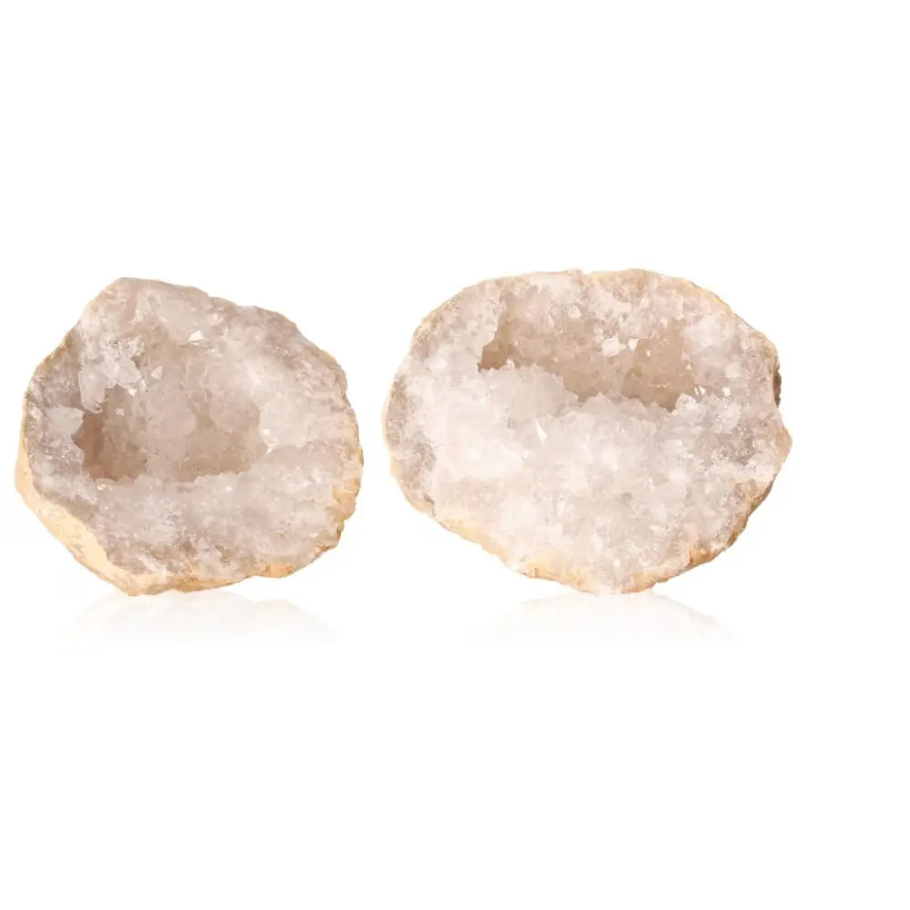 Two open quartz geodes showcasing sparkling white crystals, each weighing between 700-900g, ideal for decor and energy amplification.
