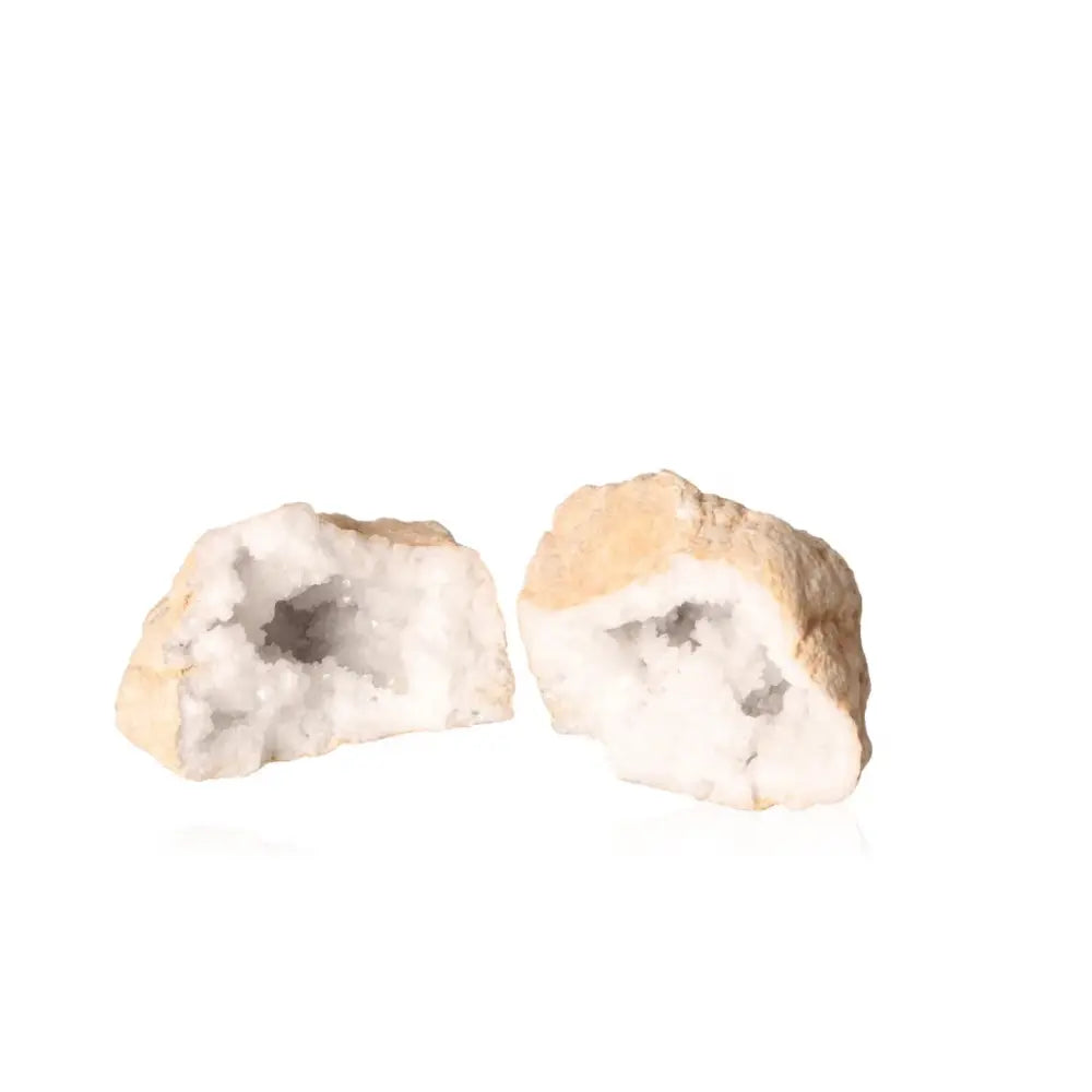 Open Quartz Geode displaying sparkling white crystals, weighing 900-1200g. Perfect for enhancing energy and adding natural beauty to spaces.