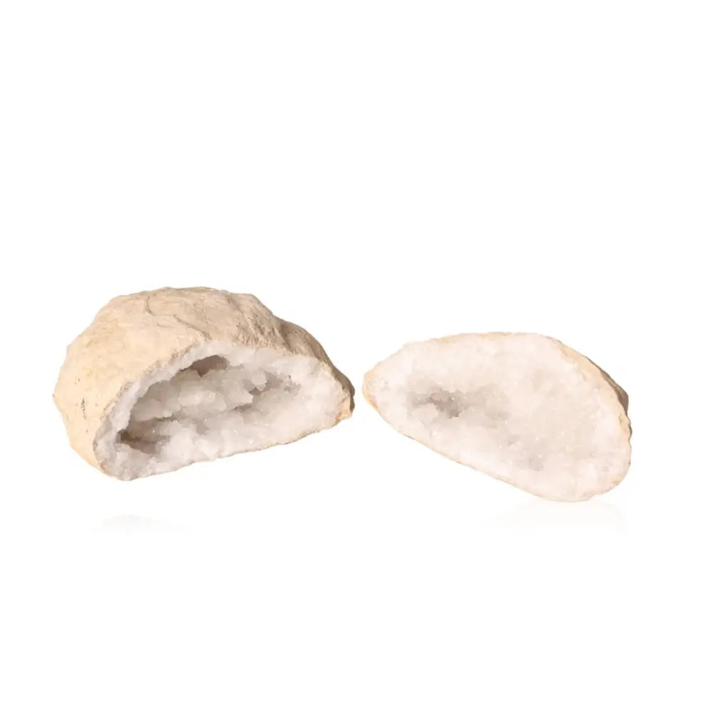 Quartz Geode split open revealing sparkling white crystals; natural decorative piece and energy source weighing 900-1200g.