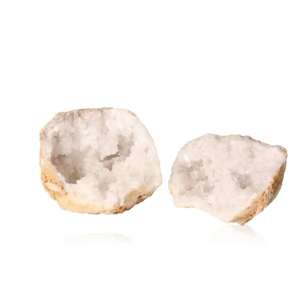 Quartz Geode showcasing cloudy white crystals inside its rugged shell, perfect for home decor or mineral collections.