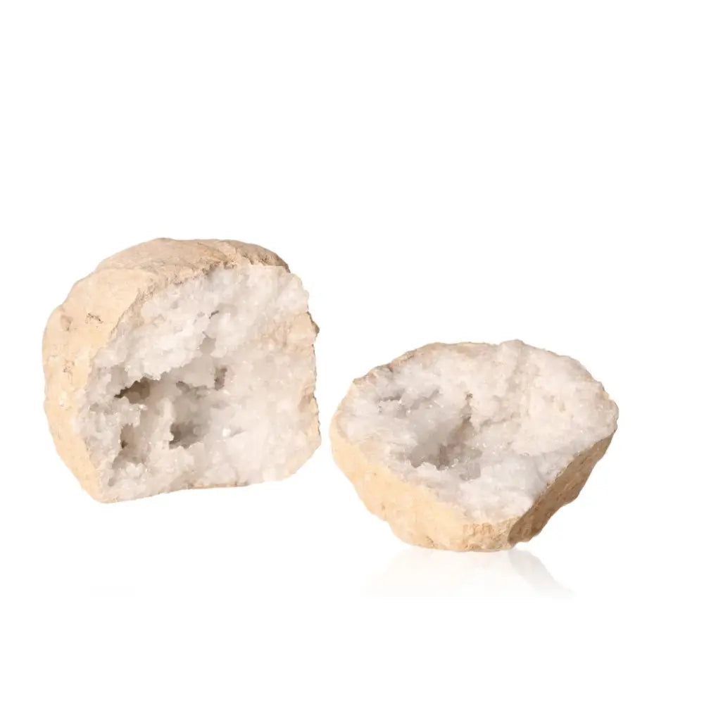 Quartz Geode (900-1200g) with sparkling white crystals revealed inside, showcasing nature's artistry and mystical allure.