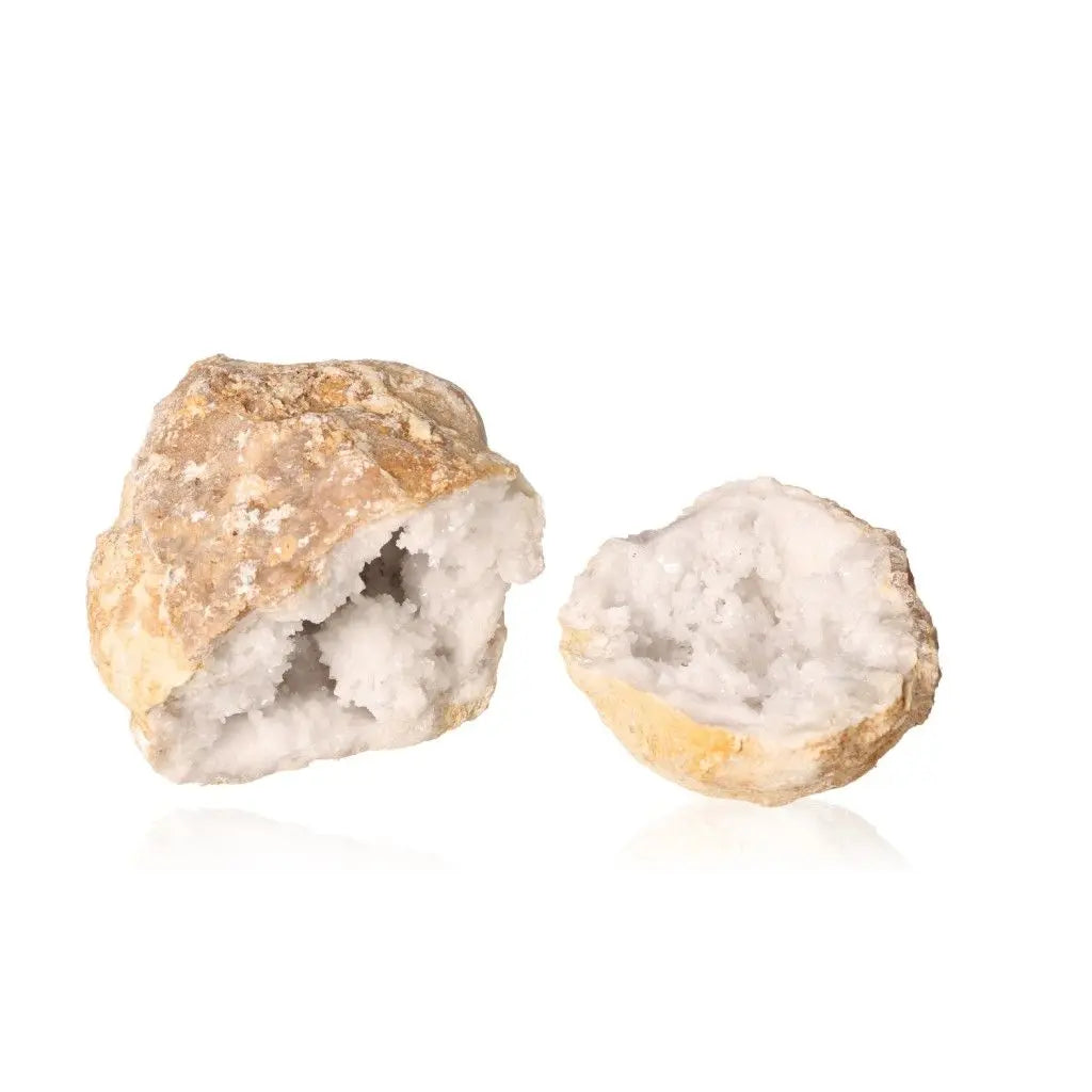 Quartz Geode with sparkling white crystals, showcasing its rugged, earthy shell. Ideal for decor with elegance and serenity.
